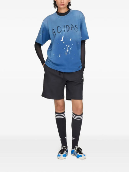 x Adidas paint-splatter logo-print T-shirt