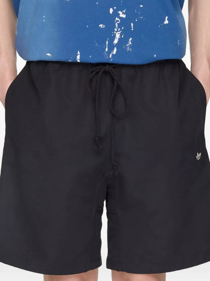 x Song for the Mute 007 three-stripe shorts